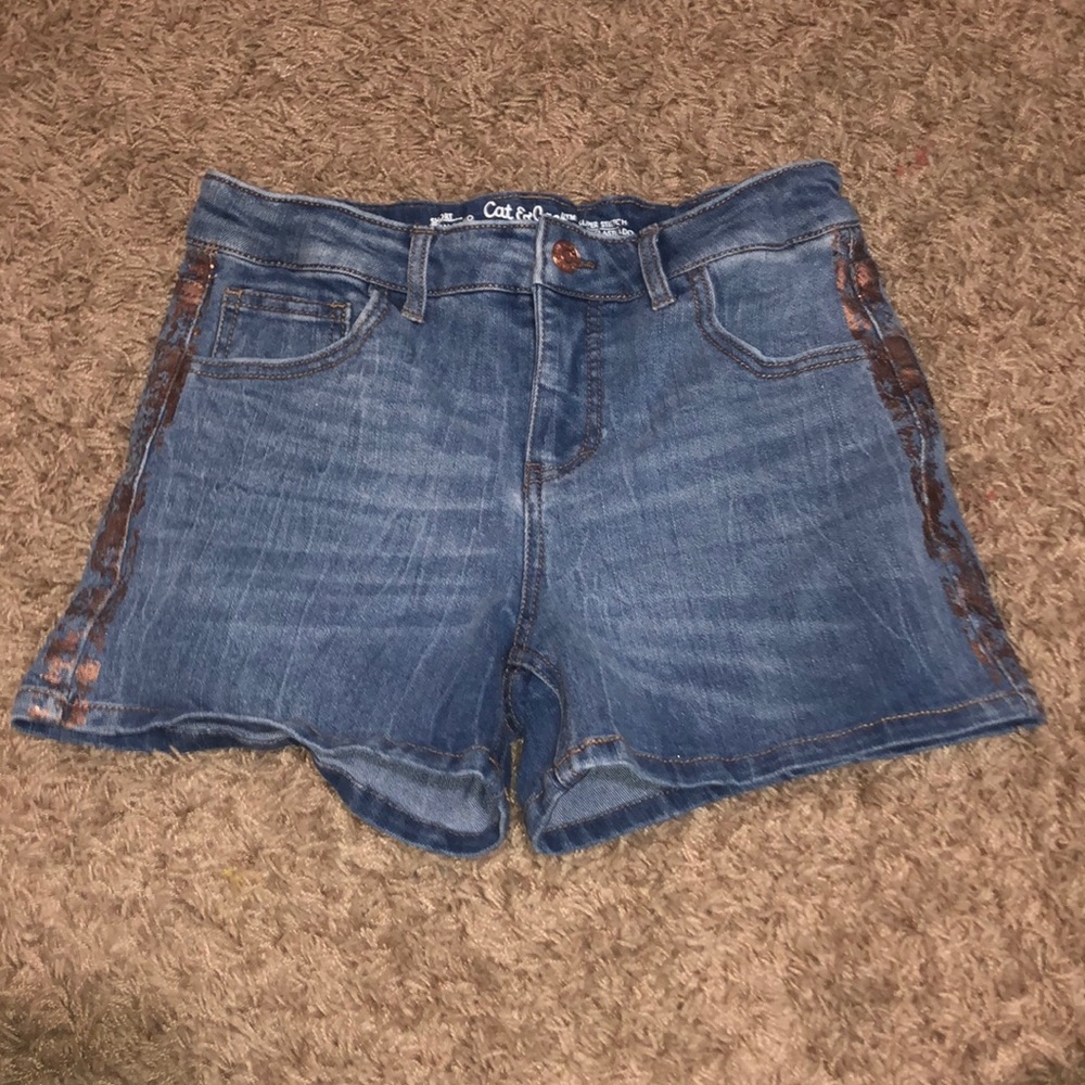 Bronze detailed jean shorts